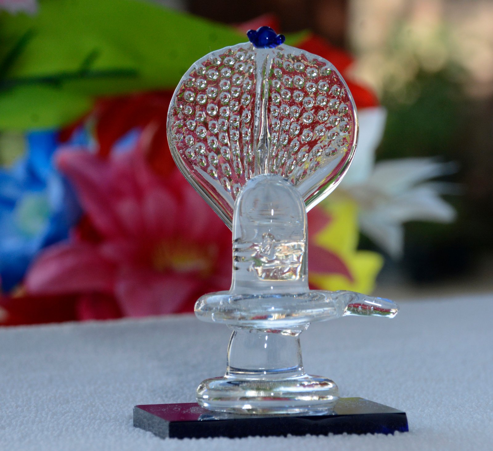 A clear glass Shivling.